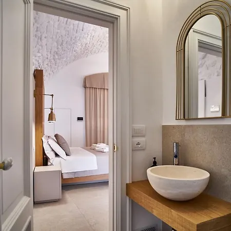 Palazzo 1892 Suites & 아파트 오스투니